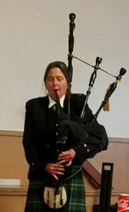Bagpiper Elise MacGregor Ferrell performs live bagpiping music for a celebration of life in Modesto, California.
