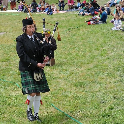 Bagpiper Elise MacGregor Ferrell performs festive music on Celtic bagpipes, for the Santa Cruz Waldorf School May Fair.